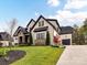 Stunning two-story home with a side entry garage and professionally landscaped yard at 2954 Holbrook Rd, Fort Mill, SC 29715