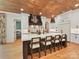 Modern kitchen with white cabinets, a large island, and stainless steel appliances at 2954 Holbrook Rd, Fort Mill, SC 29715