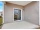 The back patio with neutral siding and a sliding door, a serene outdoor space at 3662 Charles Nw St, Conover, NC 28613