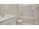 Bright bathroom features white fixtures, including a vanity and tub/shower combo at 3662 Charles Nw St, Conover, NC 28613