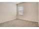 Bedroom features plush carpeting, natural light from a window, and neutral paint at 3662 Charles Nw St, Conover, NC 28613