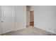 View of a bedroom showcasing a neutral color palette with plush carpeting and a closet at 3662 Charles Nw St, Conover, NC 28613