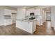 Well-equipped kitchen featuring granite countertops, an island, stainless steel appliances and neutral decor at 3662 Charles Nw St, Conover, NC 28613