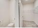 Open walk in closet with a toilet and wire shelving for storage at 3662 Charles Nw St, Conover, NC 28613