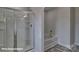 This bathroom features a glass enclosed shower and a separate soaking tub at 3905 Coleman Dr, Charlotte, NC 28215