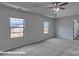 Bright bedroom with two windows and ceiling fan at 3905 Coleman Dr, Charlotte, NC 28215