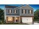 Two-story home with gray siding, brick accents, a two car garage, and a well-manicured front lawn at 3905 Coleman Dr, Charlotte, NC 28215