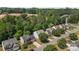 Aerial view of a quiet neighborhood, showcasing well-kept lawns and mature trees, offering a serene living environment at 4729 Nijinsky Ct, Charlotte, NC 28216