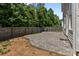 An inviting backyard patio featuring a custom paver design, offering a perfect outdoor space for relaxation and entertainment at 4729 Nijinsky Ct, Charlotte, NC 28216