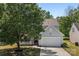 Charming two-story home with a well maintained lawn and attached two car garage at 4729 Nijinsky Ct, Charlotte, NC 28216