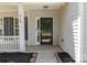 Charming front entrance featuring a stylish black door with a glass insert and a well-maintained walkway at 4729 Nijinsky Ct, Charlotte, NC 28216