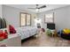 Bedroom with ceiling fan, hard wood floors, two windows, and plenty of toys at 503 Overbrook Dr, Albemarle, NC 28001