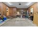 Spacious garage with paneling, a workbench, and interior home access at 503 Overbrook Dr, Albemarle, NC 28001