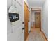 Entryway with white front door, coat closet, wood floors, and decorative touches at 503 Overbrook Dr, Albemarle, NC 28001