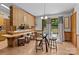 Open kitchen layout with breakfast bar seating and outdoor access to the backyard at 503 Overbrook Dr, Albemarle, NC 28001
