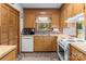 Charming kitchen with wood cabinets, updated appliances, and a bright, inviting atmosphere at 503 Overbrook Dr, Albemarle, NC 28001