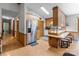 Functional kitchen with stainless steel appliances, wood cabinets, and breakfast bar seating at 503 Overbrook Dr, Albemarle, NC 28001