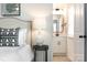Tastefully decorated main bedroom with a side view into an ensuite bathroom at 5112 Izzo Ln, Charlotte, NC 28214