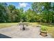 Backyard with concrete patio, table and chairs, and gazebo at 6215 Simpson Rd, Charlotte, NC 28216