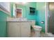 Fresh bathroom with a vanity, toilet, and walk-in shower with glass doors at 6215 Simpson Rd, Charlotte, NC 28216