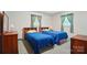 Bedroom featuring two beds, matching furniture, and neutral walls and carpet at 6215 Simpson Rd, Charlotte, NC 28216