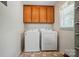 Bright laundry room with a large window and washer and dryer hookups at 6215 Simpson Rd, Charlotte, NC 28216