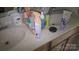 Bathroom vanity with double sinks, storage, and countertop space at 632 Pawley Dr, Charlotte, NC 28214