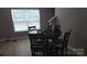 The dining area has a round table with 4 chairs and bright window at 632 Pawley Dr, Charlotte, NC 28214