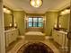 Luxurious bathroom with a soaking tub, double vanity, and stylish finishes at 67 41St Nw Ave # 3, Hickory, NC 28601