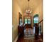 Elegant entryway featuring hardwood floors, a decorative rug, and a chandelier at 67 41St Nw Ave # 3, Hickory, NC 28601