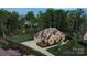 Aerial view of a brick house, showcasing its well-manicured lawn and landscaped surroundings at 67 41St Nw Ave # 3, Hickory, NC 28601