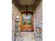 Charming front door with glass panels and floral decorations adding a welcoming touch to the entryway at 67 41St Nw Ave # 3, Hickory, NC 28601