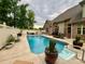 Backyard pool with poolside patio and seating, adjacent to the brick home at 67 41St Nw Ave # 3, Hickory, NC 28601