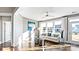 Bright and airy living room with hardwood floors, white sofa with blue pillows, and large windows at 7017 Treetop Ct, York, SC 29745