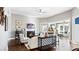 Bright living room featuring a fireplace, an open floor plan, and hardwood floors at 7017 Treetop Ct, York, SC 29745