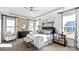 Bright main bedroom with decorative tray ceiling, neutral decor, and lots of natural light at 7017 Treetop Ct, York, SC 29745