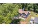 High-angle view of house and surrounding area with mature trees at 7218 Jacobs Fork Ln, Charlotte, NC 28273