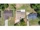 Overhead view showing house among neighborhood, showcasing the roofs, yards, and greenery at 7218 Jacobs Fork Ln, Charlotte, NC 28273