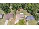 Aerial view of multiple homes in a residential area with mature trees, and well-maintained yards at 7218 Jacobs Fork Ln, Charlotte, NC 28273