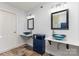 This bathroom has double sinks with beautiful granite countertops at 7218 Jacobs Fork Ln, Charlotte, NC 28273
