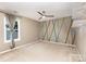 Bedroom featuring a large window and colorful wall design at 7218 Jacobs Fork Ln, Charlotte, NC 28273
