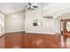 Spacious living room with hardwood floors, a vaulted ceiling, and natural light at 7218 Jacobs Fork Ln, Charlotte, NC 28273