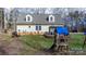 Spacious backyard with a playset, and plenty of room for outdoor activities at 7648 Forest Oak Dr, Denver, NC 28037