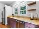 Spacious kitchen with granite countertops, stainless appliances, and beautiful natural lighting at 7648 Forest Oak Dr, Denver, NC 28037