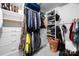 Large walk-in closet featuring custom shelving, ample storage, and a well-organized layout at 7648 Forest Oak Dr, Denver, NC 28037