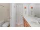Clean and bright bathroom with modern fixtures and decorative art pieces at 8414 Oak Ne Dr, Charlotte, NC 28269