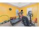 Exercise room featuring a treadmill, stationary bike, and weights at 8414 Oak Ne Dr, Charlotte, NC 28269