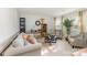 Comfortable living room with neutral tones, plush seating, and plenty of natural light at 8414 Oak Ne Dr, Charlotte, NC 28269
