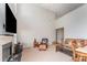 Spacious living room featuring a cozy fireplace, plush seating, and ample natural light at 8414 Oak Ne Dr, Charlotte, NC 28269