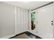 Entryway featuring tile flooring, closet space, and a door with a window to view outside at 981 Sherwood Cir, Lancaster, SC 29720